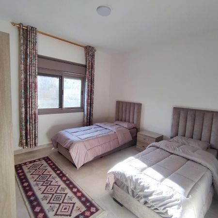 Red Rose City Apartment 瓦迪穆萨 外观 照片