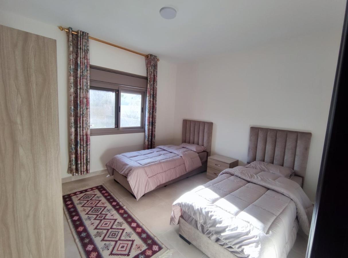 Red Rose City Apartment 瓦迪穆萨 外观 照片